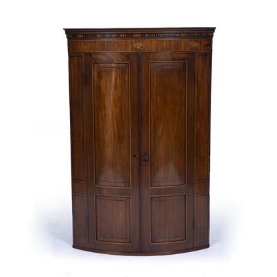 Lot 227 - A GEORGE III MAHOGANY HANGING BOW FRONTED CORNER CUPBOARD