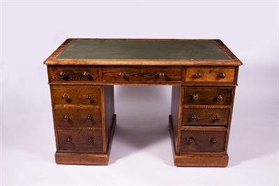 Lot 258 - AN OAK PEDESTAL DESK