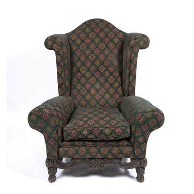 Lot 271 - A LARGE UPHOLSTERED WING BACK ARMCHAIR