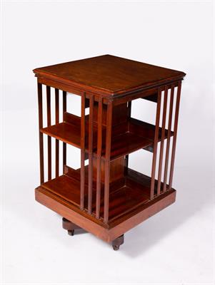 Lot 281 - AN EDWARDIAN WALNUT ROTATING BOOKCASE