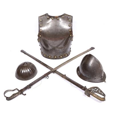 Lot 5 - AN ANTIQUE STEEL BREAST PLATE with brass studs and leather trimmed rim