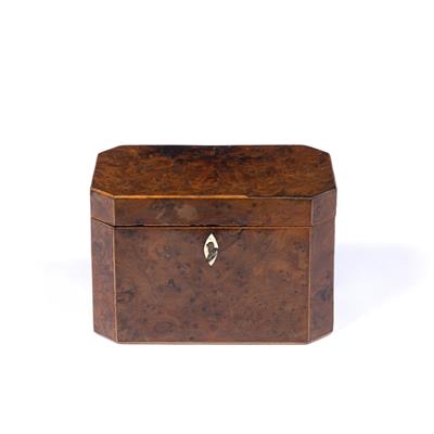 Lot 28 - A GEORGE III BURR YEW TEA CADDY of rectangular form with canted corners