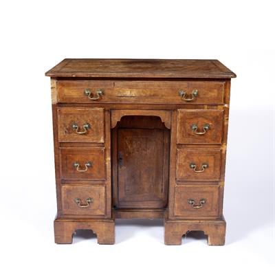 Lot 51 - AN 18TH CENTURY WALNUT VENEERED AND FEATHER BANDED KNEEHOLE DESK