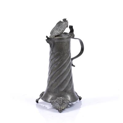 Lot 85 - A GERMAN PEWTER FLAGON the hinged lid with heraldic crest