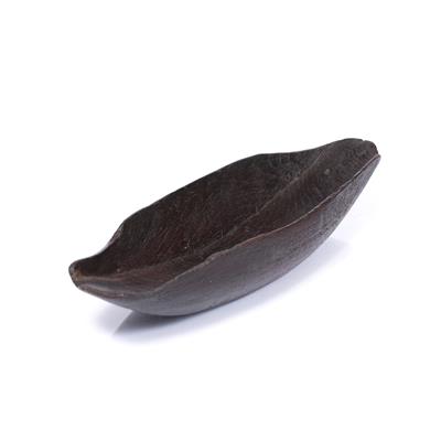 Lot 113 - AN AMERICAN INDIAN INUIT cedar wood bowl of elongated form with residue of old patination