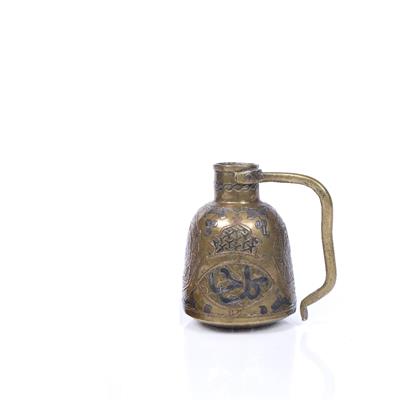 Lot 131 - AN OLD ISLAMIC SILVERED