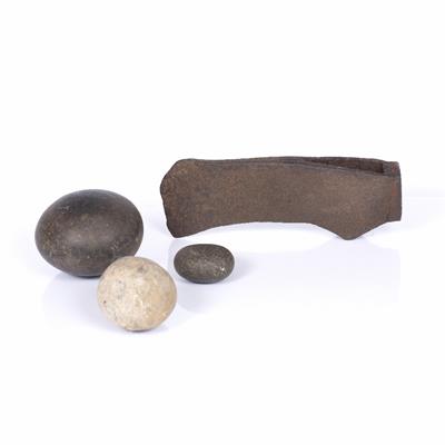 Lot 143 - A GROUP OF BRITISH ANTIQUITIES including three hammer stones and an iron battle axe