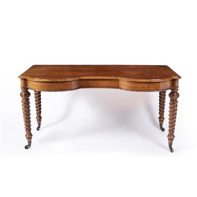Lot 172 - A VICTORIAN WALNUT TABLE of double bowed outline