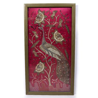 Lot 185 - A DECORATIVE WALL HANGING PANEL embroidered with peacock upon a flowering branch similar to the