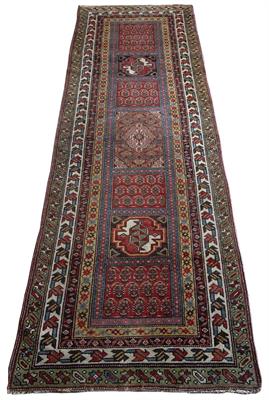 Lot 203 - AN OLD PERSIAN POLYCHROME RUNNER with central alternating panels of botehs and stylised birds within