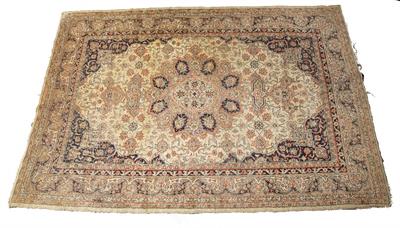 Lot 210 - AN OLD TURKISH SIVAS RUG decorated with a central radiating foliate medallion in pastel colours