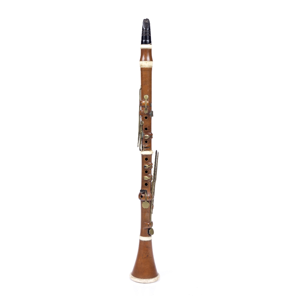 Lot 220 - A 19TH CENTURY BOXWOOD CLARINET with ivory ferrules
