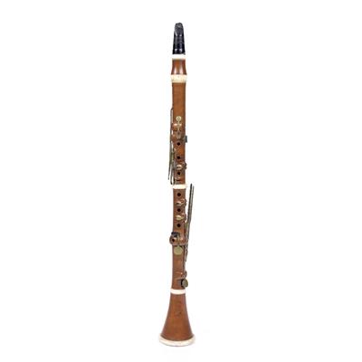 Lot 220 - A 19TH CENTURY BOXWOOD CLARINET with ivory ferrules