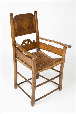 Lot 23 - Elm and fruitwood elbow chair