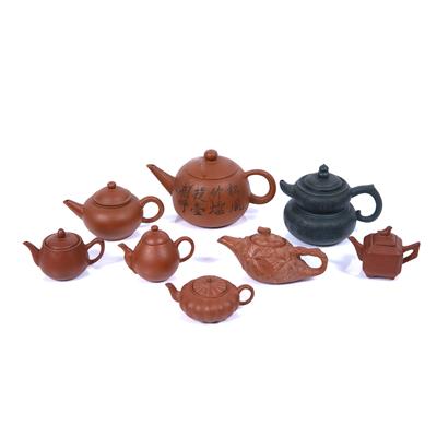 Lot 269 - Group of eight Yixing teapots