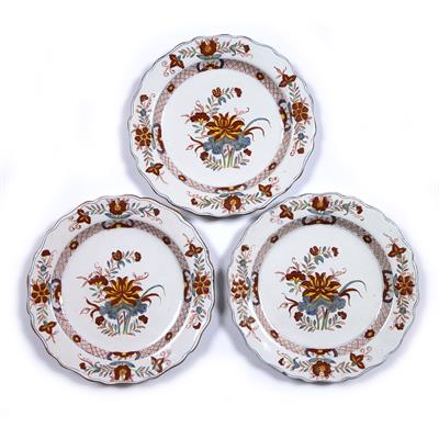 Lot 296 - Three faience plates