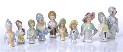 Lot 332 - Collection of porcelain pincushion ladies