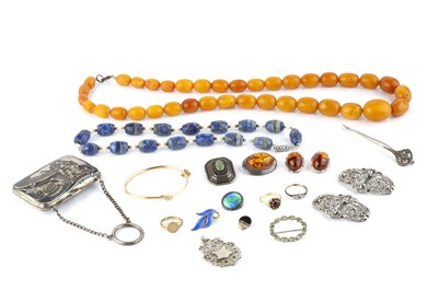 Lot 244 - A collection of jewellery, comprising an amber...