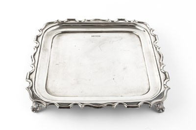 Lot 596 - A George V silver square section salver, with...