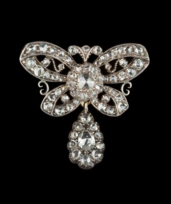 Lot 163 - A diamond panel brooch, modelled as a ribbon...