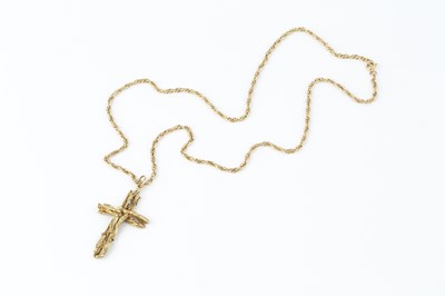 Lot 126 - A 9ct gold cross pendant by Alan Martin Gard,...