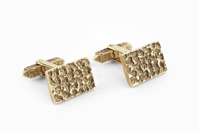 Lot 125 - A pair of 9ct gold cufflinks, each rectangular...