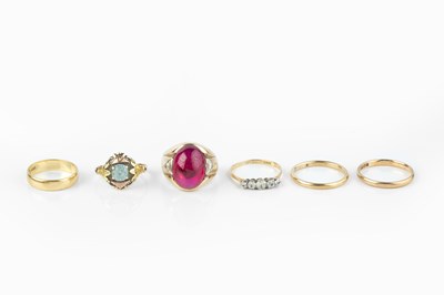 Lot 100 - A collection of rings, comprising a blue stone...