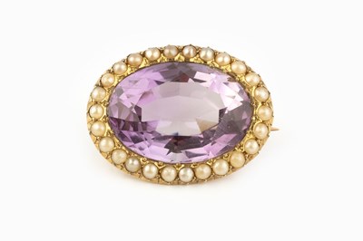 Lot 53 - An amethyst and half pearl cluster brooch, the...