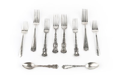 Lot 394 - A set of six American silver table forks, with...