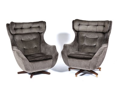 Lot 81 - Parker Knoll pair of 'Statesman' swivel...