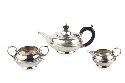 Lot 405 - A silver three piece tea service, of...