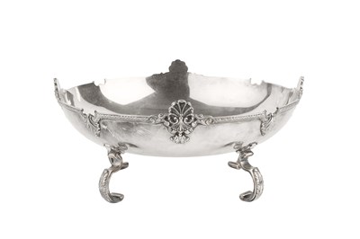 Lot 407 - A silver shallow bowl, the shaped border with...