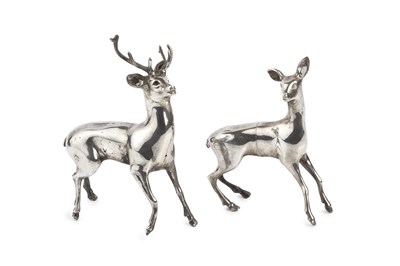 Lot 339 - A pair of silver figures of deer, modelled as...