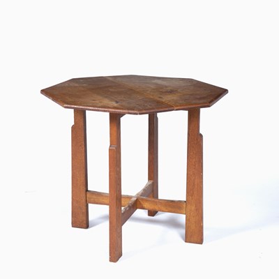 Lot 33 - Cotswold School oak, octagonal topped...