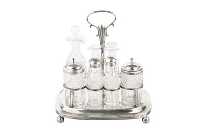 Lot 413 - A George IV silver condiment stand, the...