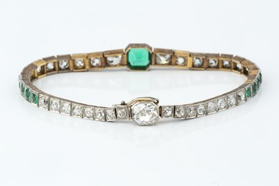 Lot 194 - An Art Deco emerald and diamond line bracelet,...