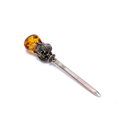 Lot 448 - Scandinavian style white metal and amber...