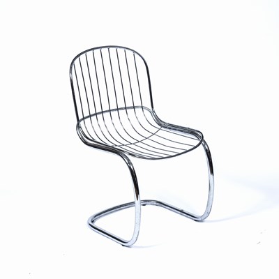 Lot 25 - In the manner of Bertoia chrome metal chair,...