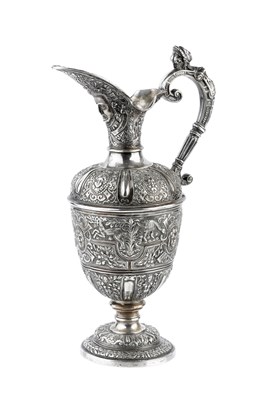 Lot 418 - A mid Victorian silver Cellini pattern ewer,...