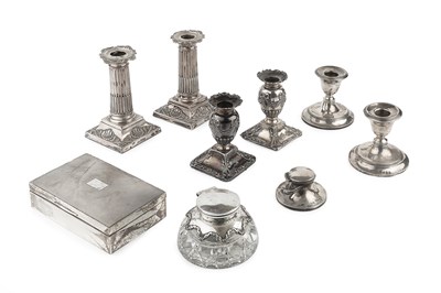 Lot 426 - A pair of Edwardian silver candlesticks, of...