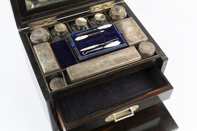 Lot 344 - A mid Victorian coromandel toilet box, the...