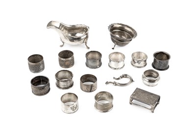 Lot 429 - A collection of twelve silver napkin rings,...