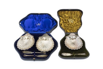 Lot 431 - A pair of Edwardian silver butter shells, with...