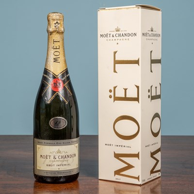 Lot 1025 - Of Formula One interest: a presentation 'Moet Formula One Silver Trophy' bottle of Champagne