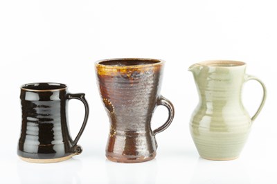 Lot 511 - Leach Pottery An early mug treacle glaze with...