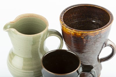 Lot 511 - Leach Pottery An early mug treacle glaze with...