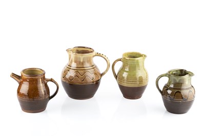 Lot 535 - Winchcombe Pottery Four early jugs, circa 1930...