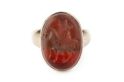 Lot 48 - A carnelian intaglio ring, the possibly...