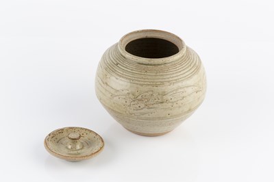 Lot 555 - Jim Malone (b.1946) Pot and cover pale green...