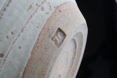 Lot 555 - Jim Malone (b.1946) Pot and cover pale green...